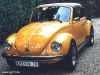 Oranje Volkswagen kever Superbeetle