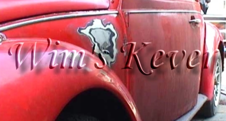 Logo van Wim's rode Volkswagen kever 1302